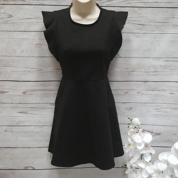 BCBGeneration Dresses & Skirts - BCBGeneration black ponte flutter cap sleeve dress